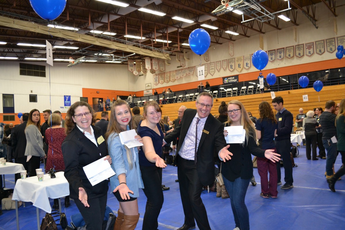 Tami Macintosh, Kylie Morford, Janina Maricle, Dave Maurer (RBC) , and Rayna Perry showing off their RBC Women in Trades Bursary cheques